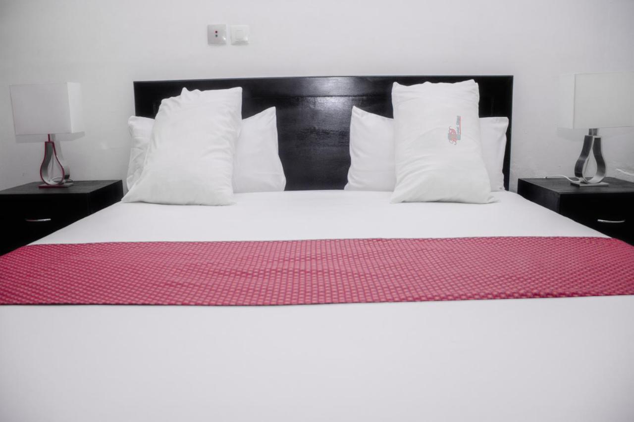 Hotel Djigui Abidjan Buitenkant foto